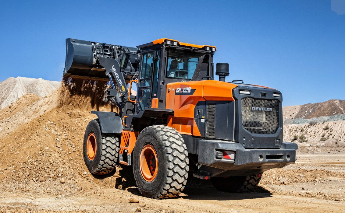 DEVELON DL220-7 Wheel Loader dumping gravel