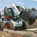 Bobcat S650 Skid Steer Loader dumping cement