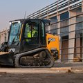 JCB 250T Compact Track Loader hauling dirt on construction site