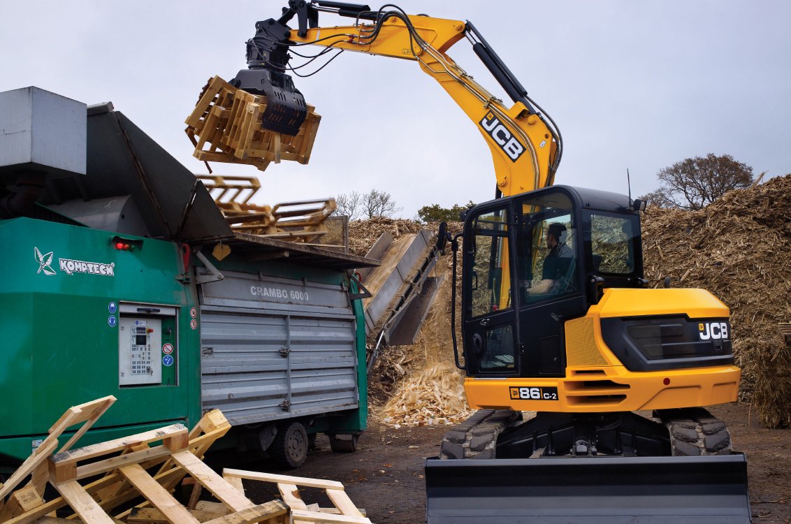 JCB 86C-2 Mini Excavator recycling scrap wood