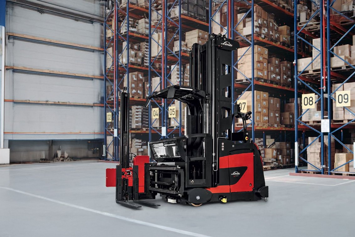 Linde K-MATIC Automated Narrow Aisle Truck two working in a warehouse
