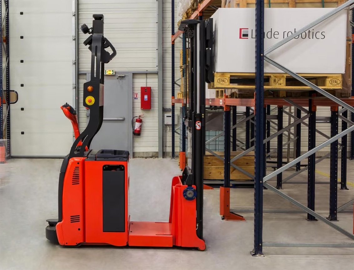 Linde L-MATIC AC Automated Counterbalance Pallet Stacker in warehouse Linde L-MATIC AC Automated Counterbalance Pallet Stacker in warehouse