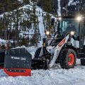 Bobcat L65 Compact Wheel Loader pushing snow