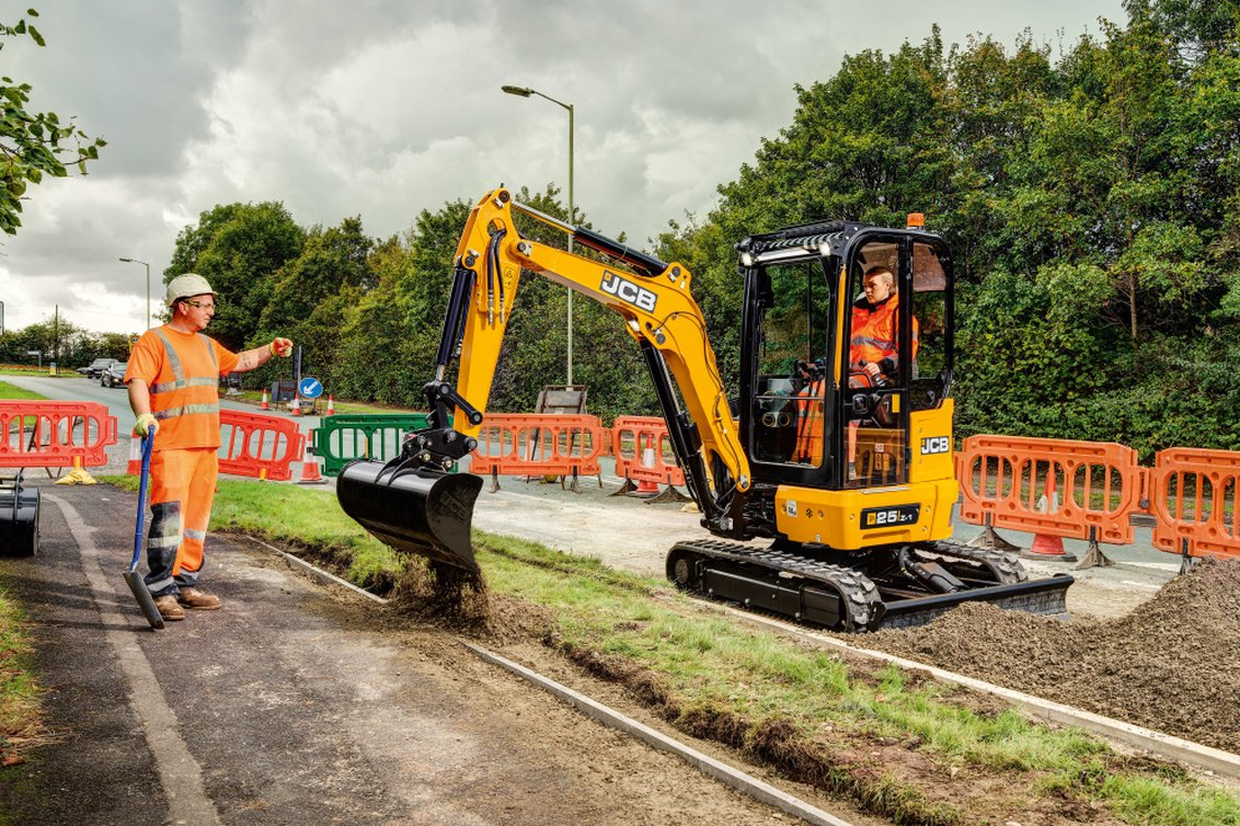 JCB 25Z-1 Mini Excavator dumping soil