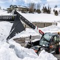 Bobcat TL519 Telehandler clearing snow