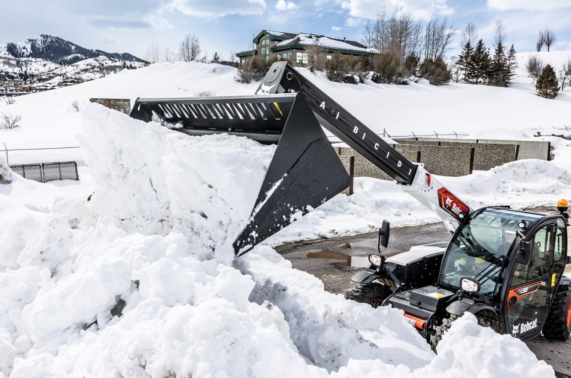 Bobcat TL519 Telehandler clearing snow