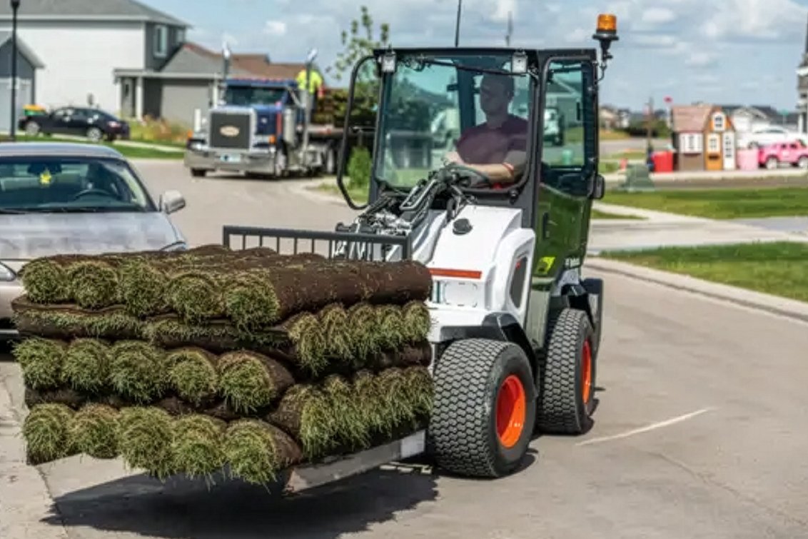 Bobcat L28 Small Articulated Loader delivering sod