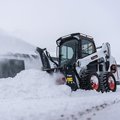 Bobcat S590 Skid Steer Loader with snow blower attachment