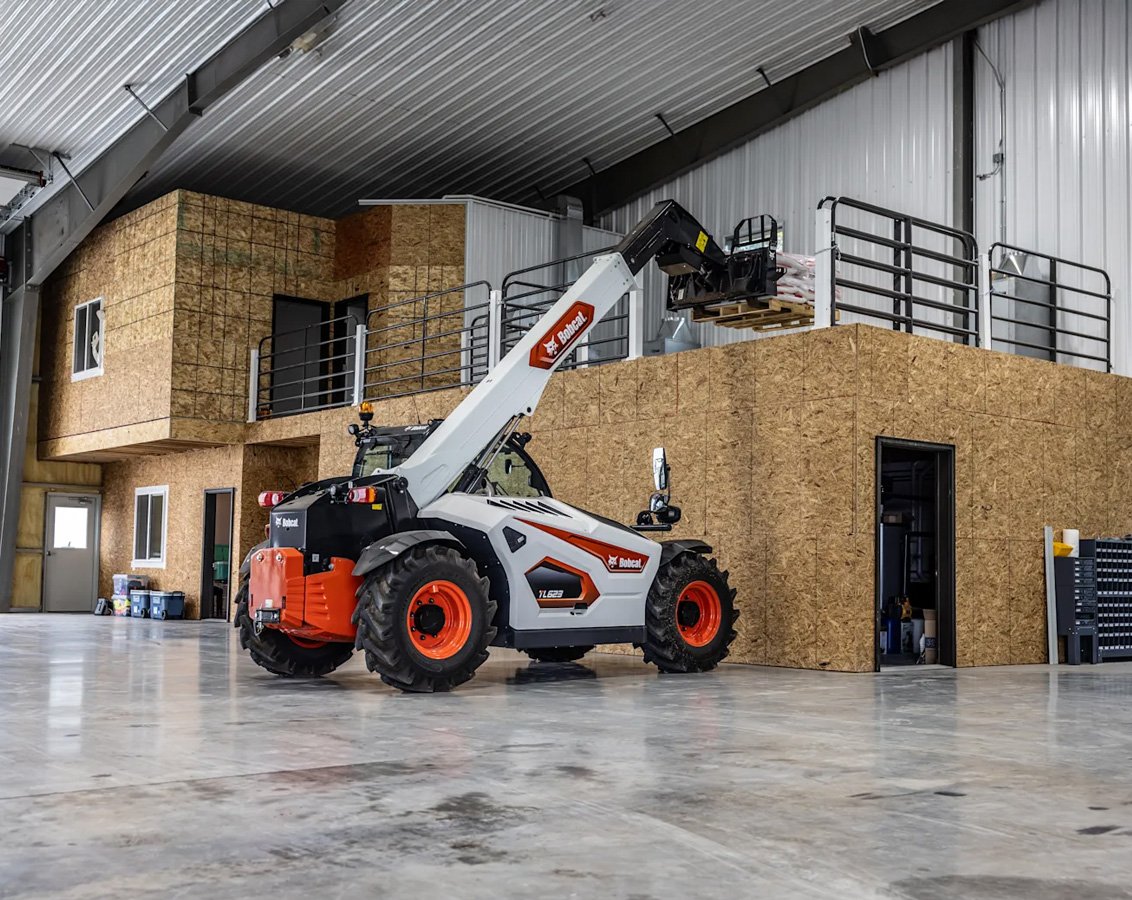 Bobcat TL623 Telehandler storing products in a high loft