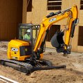 JCB 55Z-1 Mini Excavator grading a construction site