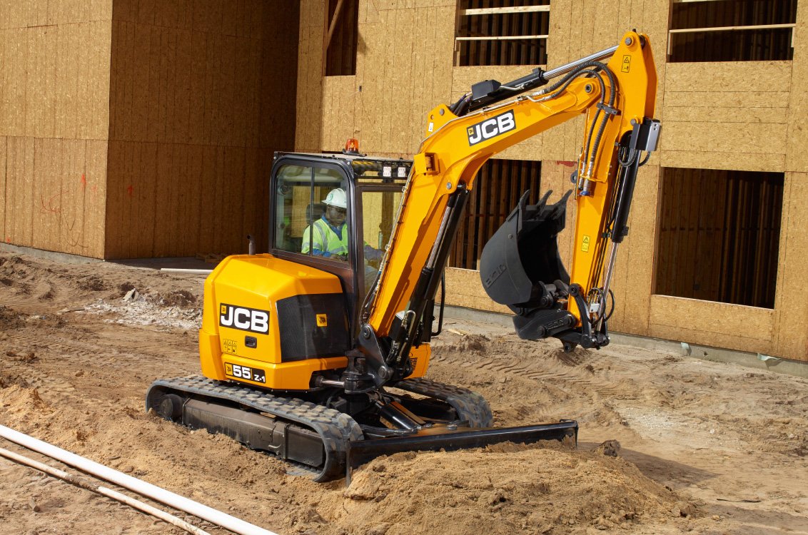 JCB 55Z-1 Mini Excavator grading a construction site