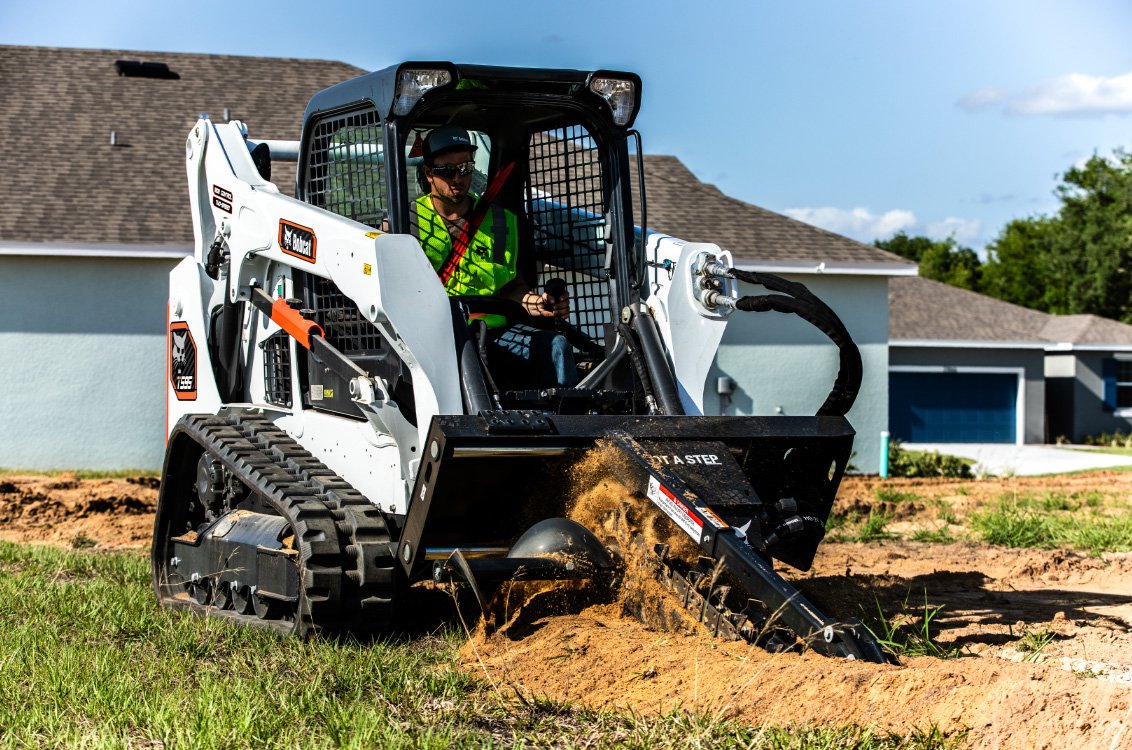 Bobcat T595 Compact Track Loader trenching