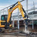JCB 85Z-2 Mini Excavator breaking concrete