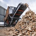 Doppstadt CoreShred 250 Twin-Shaft Shredder shredding scrap wood and construction debris