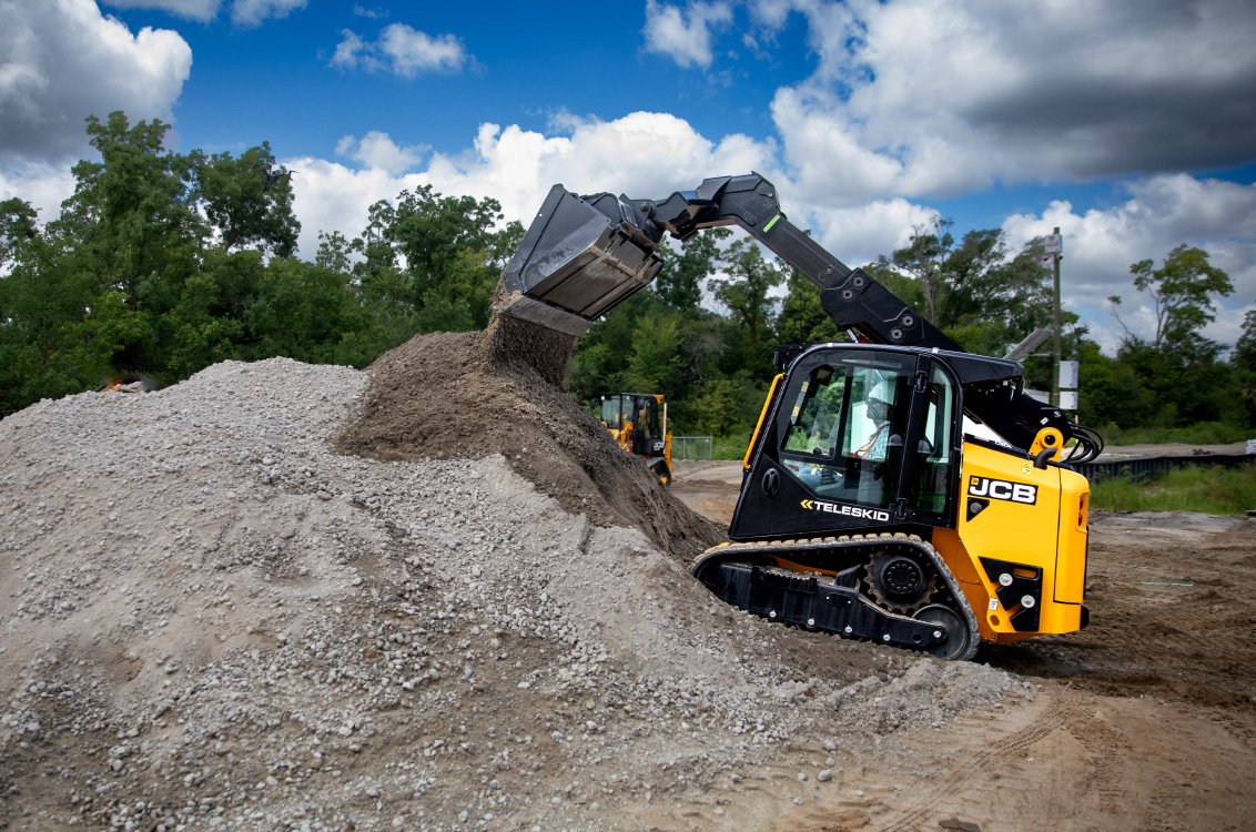 JCB 2TS-7T Teleskid Compact Track Loader dumping gravel