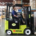 Clark SEC32 Electric Rider Cushion Forklift in a warehouse