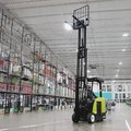 Clark SES25 Electric Stand-Up Cushion Forklift high mast lift in a warehouse
