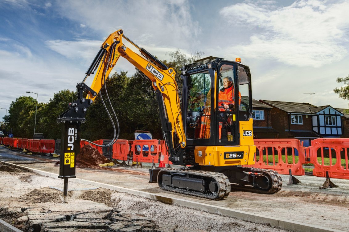 JCB 25Z-1 Mini Excavator breaking asphalt