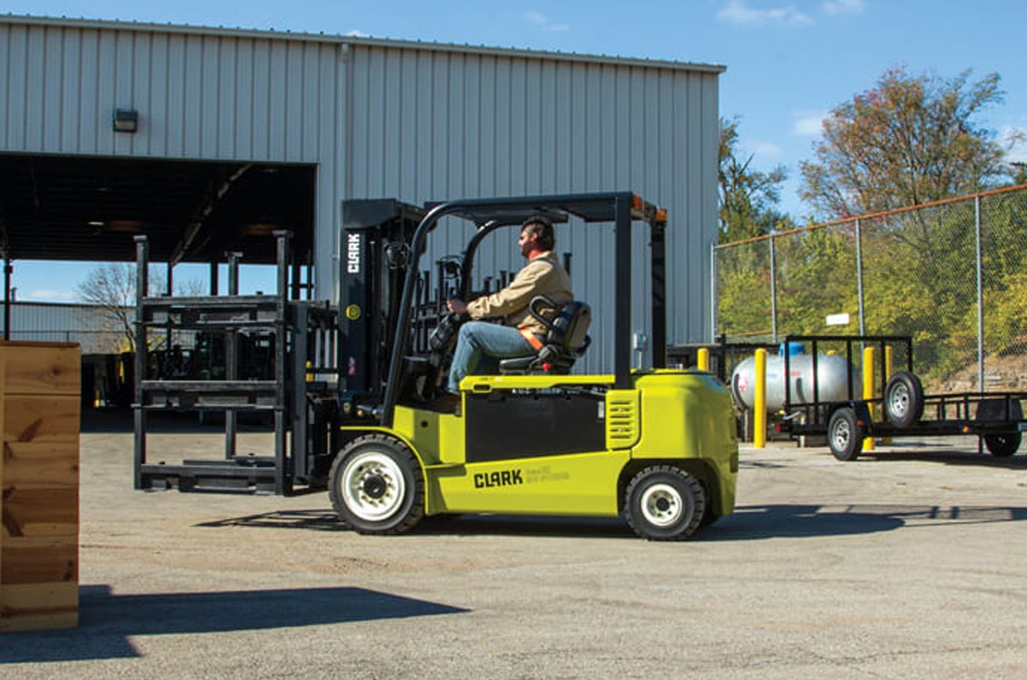 Clark GEX45 Electric Rider Pneumatic Forklift moving overly large freight