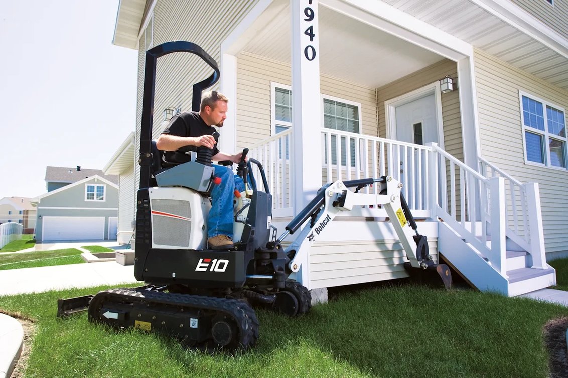 Bobcat E10 Mini Excavator digging landscaping