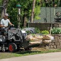 Bobcat CT1025 HST Sub-Compact Tractor hauling wood mulch
