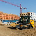 JCB 270T Compact Track Loader hauling dirt on construction site
