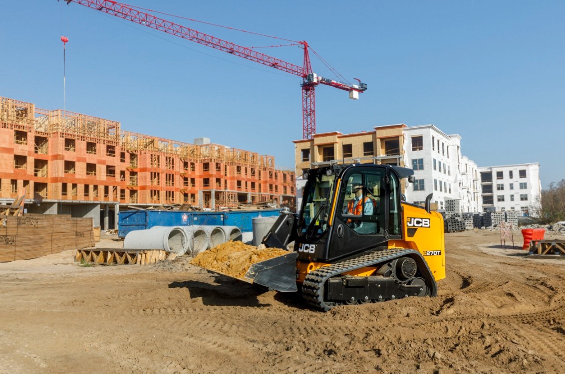 JCB 270T Compact Track Loader hauling dirt on construction site