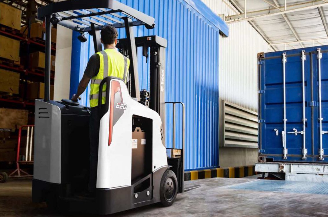 Bobcat B18SU-9 Stand-Up Electric Cushion Forklift in a warehouse