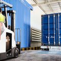 Bobcat B18SU-9 Stand-Up Electric Cushion Forklift in a warehouse
