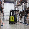 Clark SES17 Electric Stand-Up Cushion Forklift in a warehouse