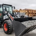 Bobcat L95 Compact Wheel Loader hauling gravel