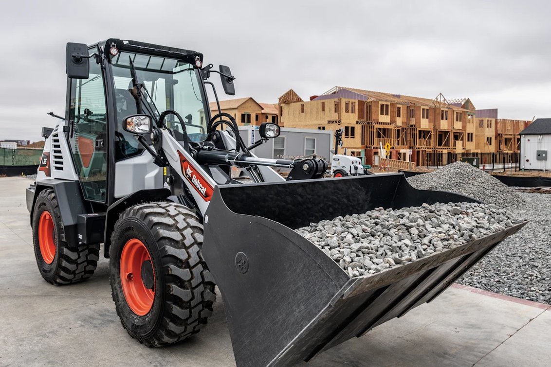 Bobcat L95 Compact Wheel Loader hauling gravel