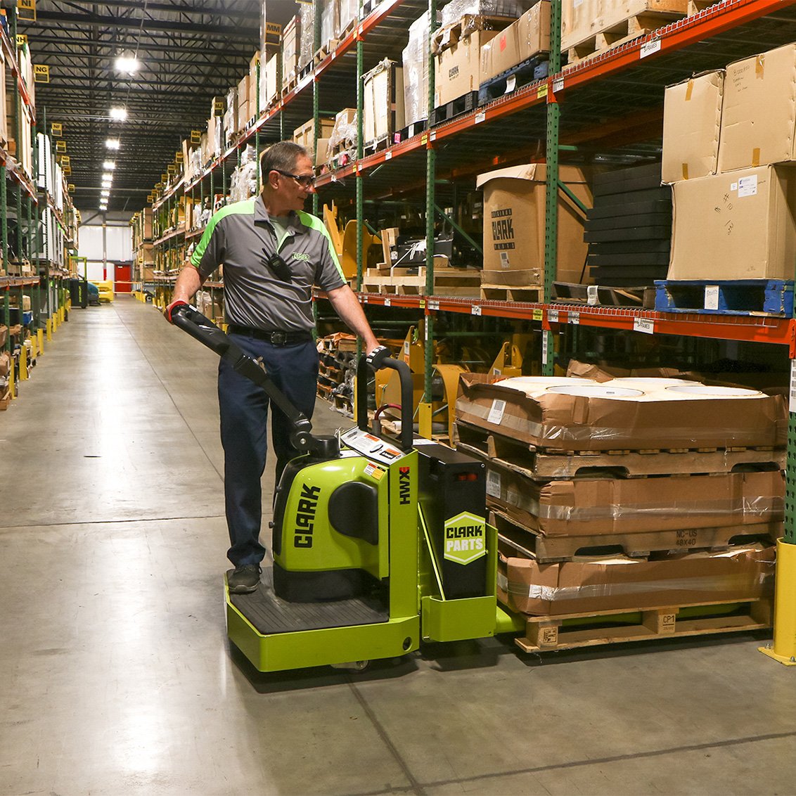 CLARK HWXE 40 Electric Pallet Truck in warehouse CLARK HWXE 40 Electric Pallet Truck in warehouse