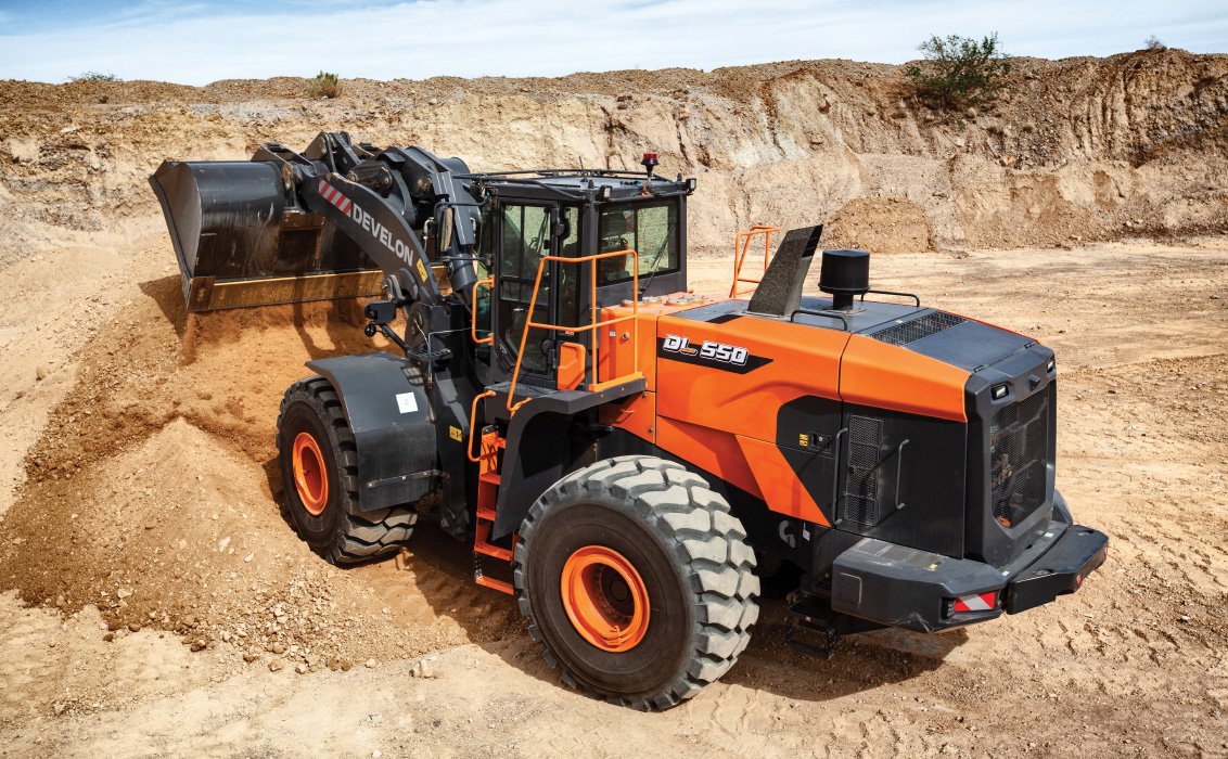 DEVELON DL550-7 Wheel Loader dumping a load of dirt