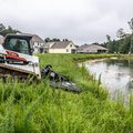 Bobcat T550 Compact Track Loader Bobcat T550 Compact Track Loader - Mower Attachment