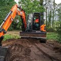 DEVELON DX62R-7 Mini Excavator filling and smoothing