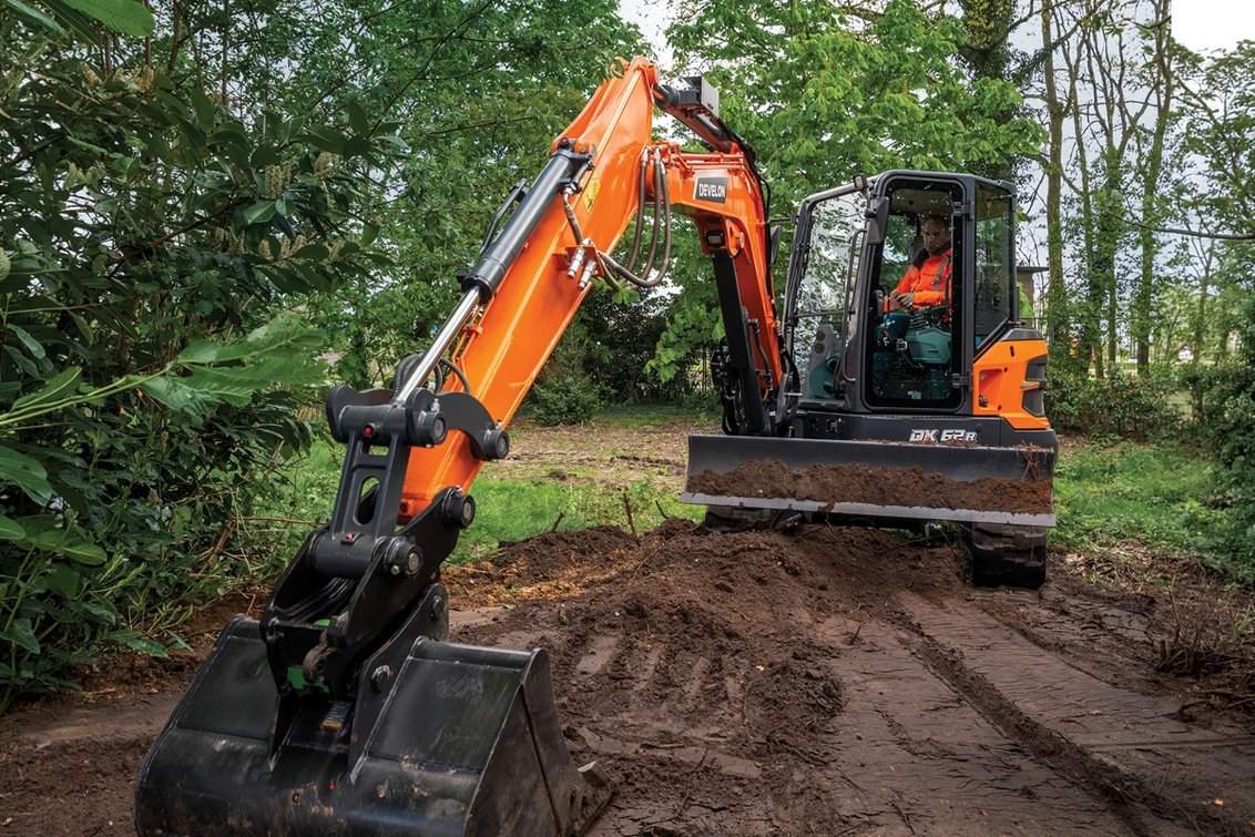 DEVELON DX62R-7 Mini Excavator filling and smoothing