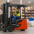 Linde E18 Electric Cushion Forklift in a warehouse