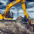 JCB 220X Crawler Excavator loading a dump truck