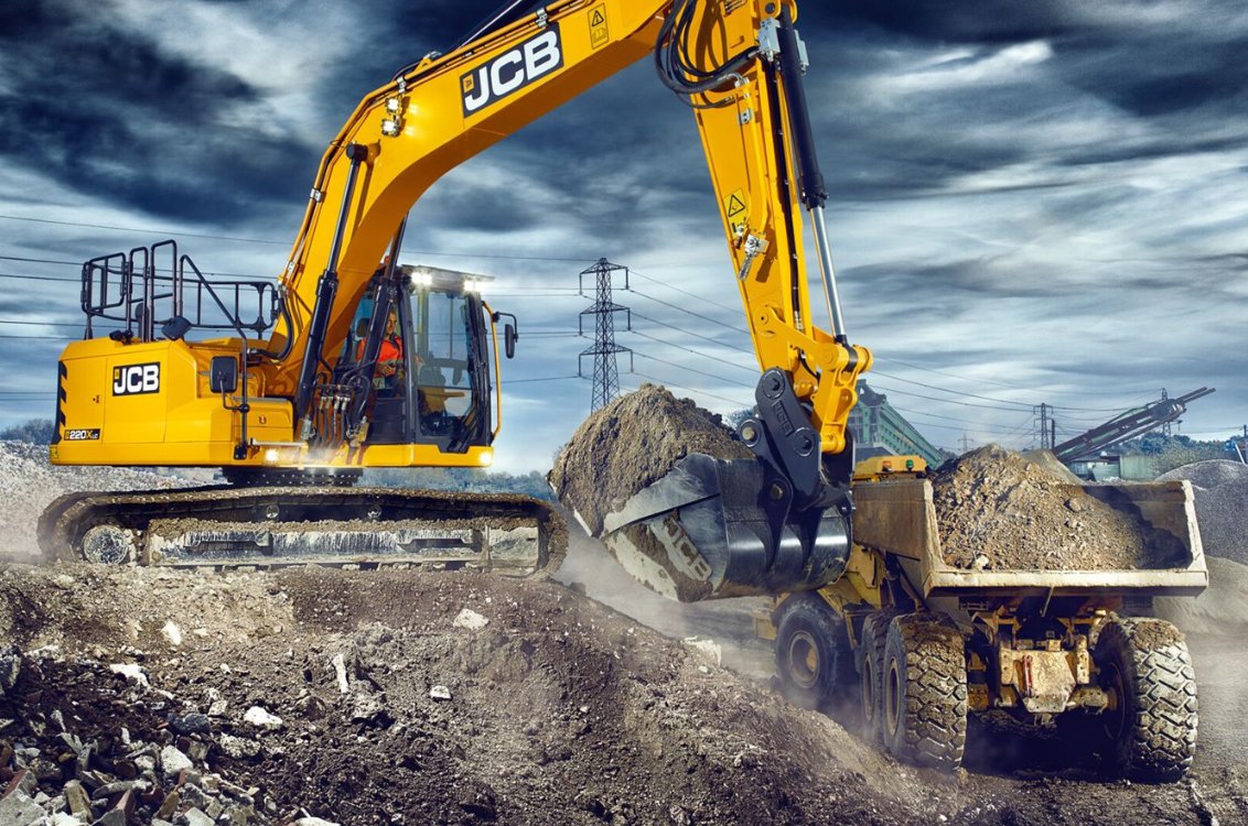 JCB 220X Crawler Excavator loading a dump truck