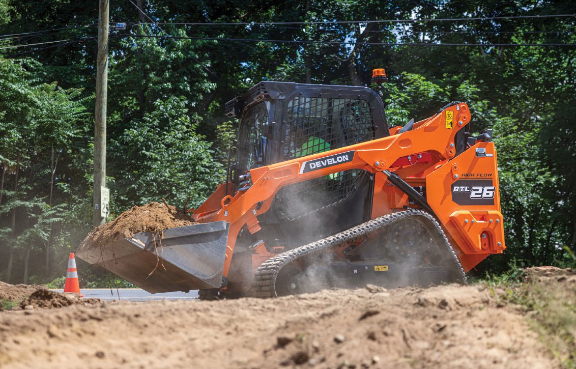 DEVELON DTL26 Compact Track Loader hauling dirt