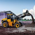 JCB 417 Wheel Loader dumping gravel on a construction site