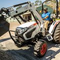 Bobcat CT2025 HST Compact Tractor dumping rocks