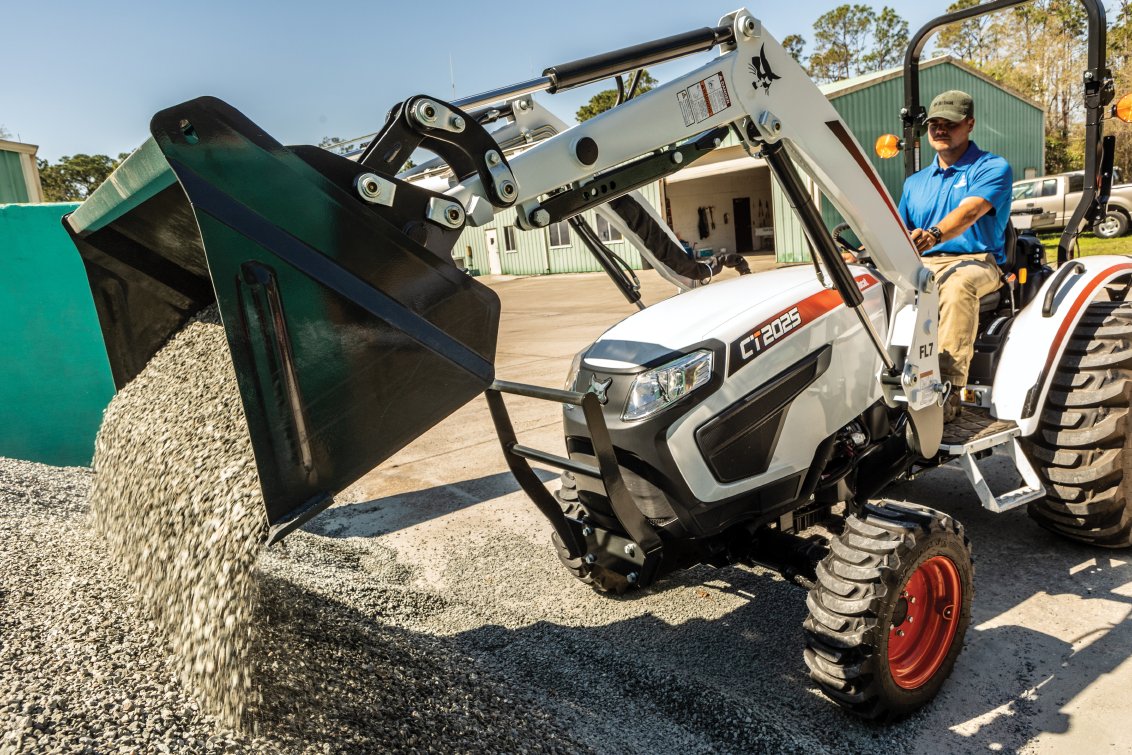 Bobcat CT2025 HST Compact Tractor dumping rocks