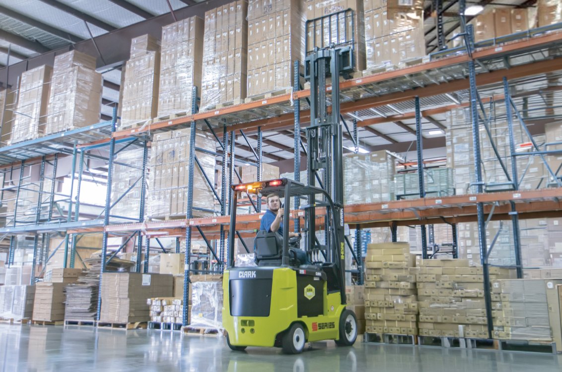 Clark SEC35 Electric Rider Cushion Forklift in a warehouse