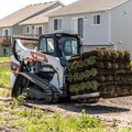 Bobcat T76 Compact Track Loader moving sod