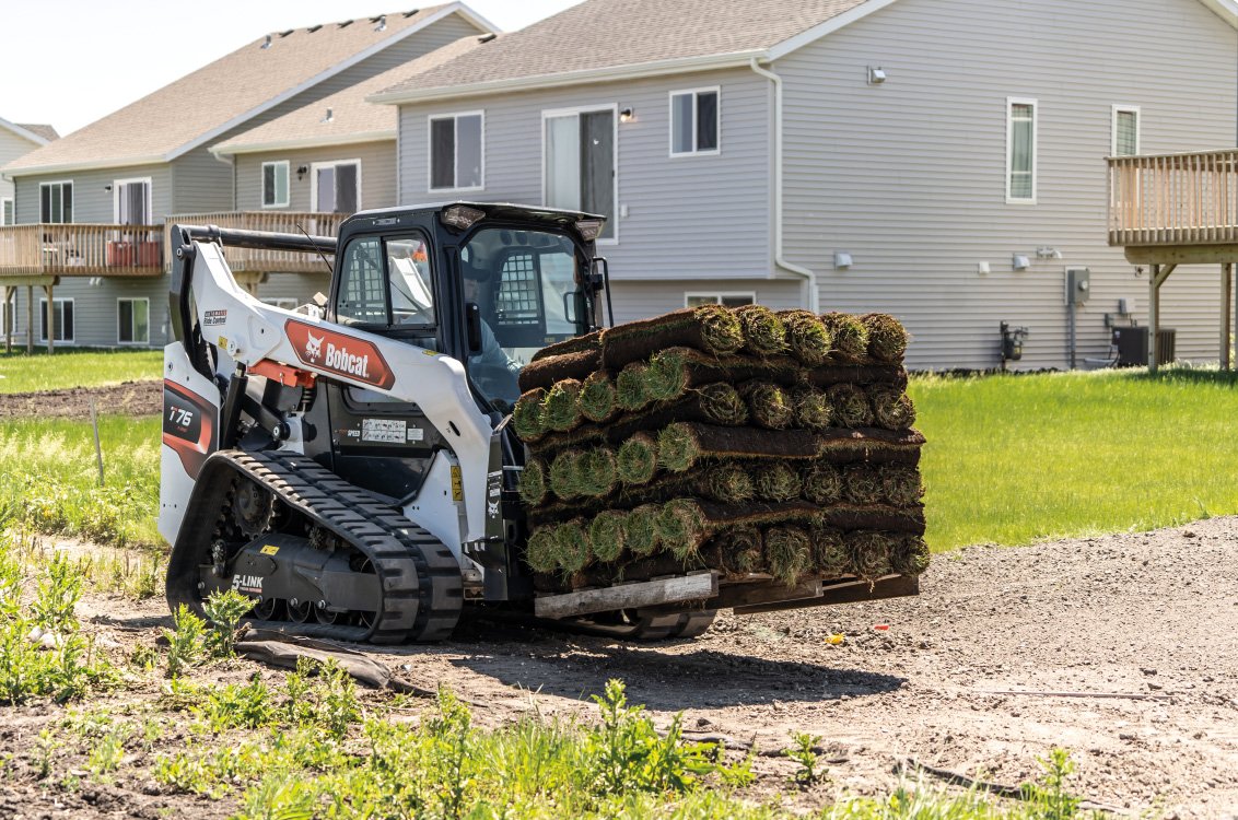 Bobcat T76 Compact Track Loader moving sod