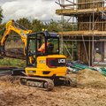 JCB 35Z-1 Mini Excavator grappling scrap wood