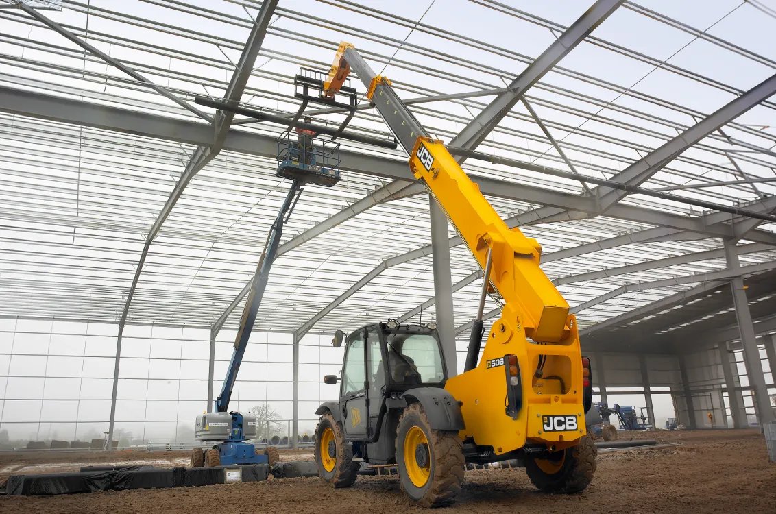 JCB 506-36 Telehandler high installation of water pipe line