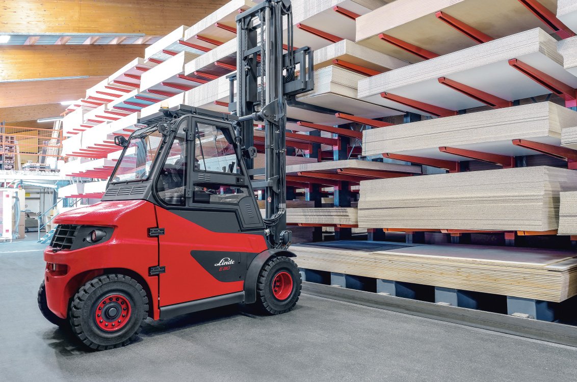 Linde E70 High-Capacity Electric Pneumatic Forklift in a plywood warehouse